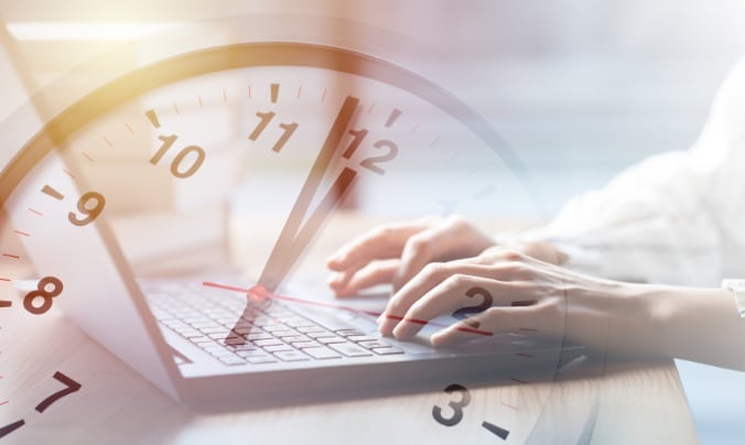 Business working times concept people work typing on laptop computer overlay with in time clock to lunch break